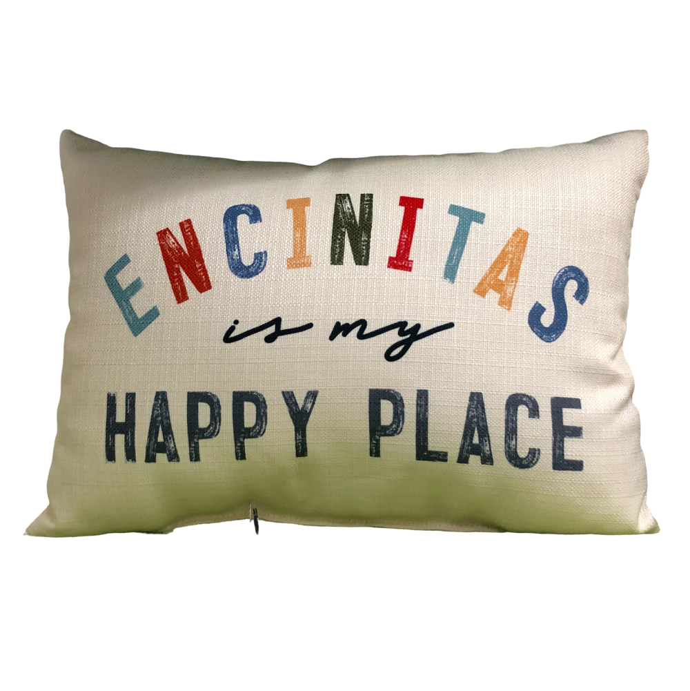 Cream pillow with words "Encintias is my happy place"